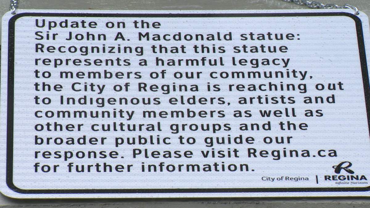 The city of Regina hung a sign on the statue last year after the legacy review got underway.