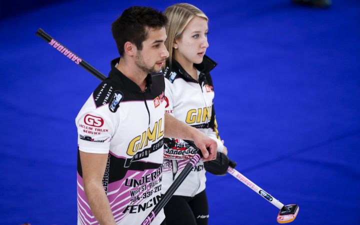 Team Sahaidak/Lott skip Kadriana Sahaidak, right, and third Colton Lott discuss strategy as they play Team Schmiemann/Morris at the Canadian Mixed Doubles Curling Championship in Calgary, Alta., Wednesday, March 24, 2021.