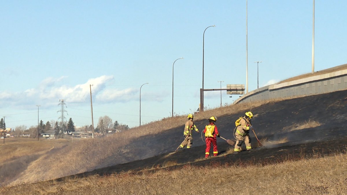 Crews battle grass fire near Max Bell arena that ‘was moving towards the bike path’ - image