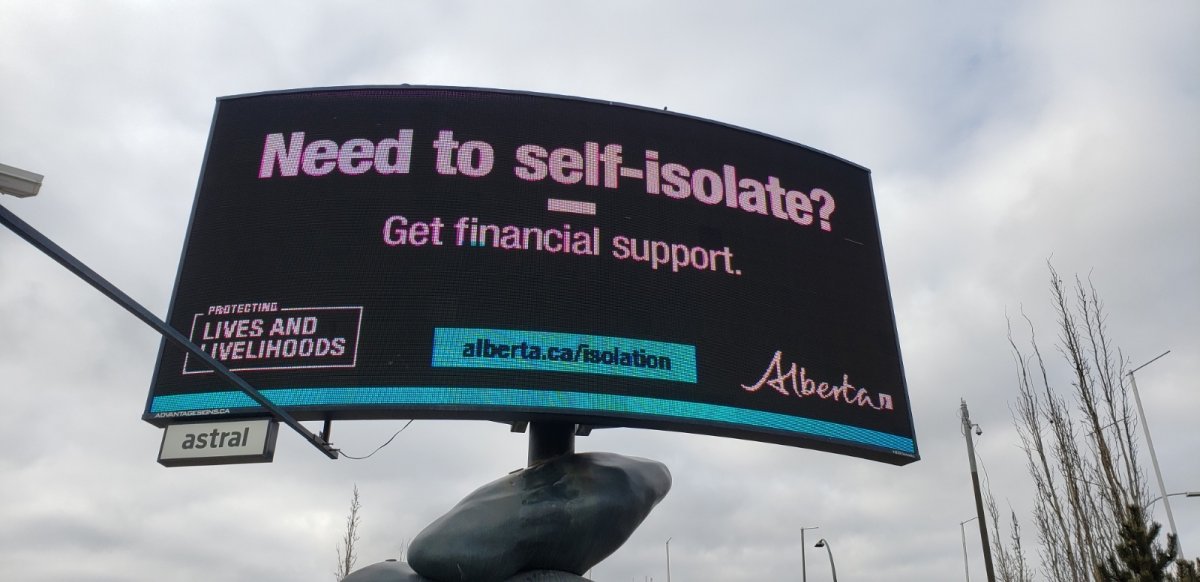 An Alberta government COVID-19 awareness campaign billboard on Gateway Blvd. near Whitemud Drive in south Edmonton on March 25, 2021.