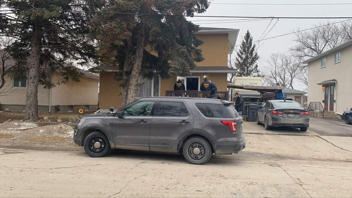 Winnipeg police at the scene at 78 Talbot Ave. Wednesday morning.