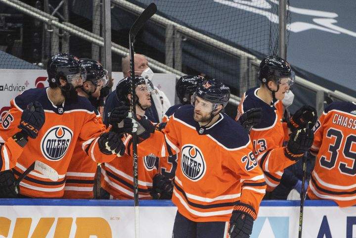 Edmonton Oilers’ Leon Draisaitl (29) celebrates a goal against the Ottawa Senators during first period NHL action in Edmonton on Wednesday, March 10, 2021.