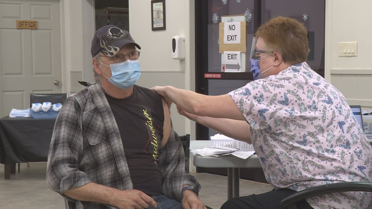 Larry Lafond gets vaccinated at a clinic in Sicamous. Interior Health has set up drop-in hours at vaccine clinics for those needing a first dose.