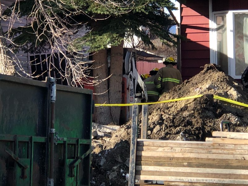 Emergency crews respond to a fatal workplace accident on Whiteram Way Northeast on March 31, 2021.