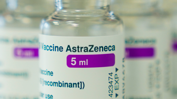 On a table in a GP practice are ampoules containing the COVID-19 vaccine from the Swedish-British pharmaceutical company AstraZeneca.
