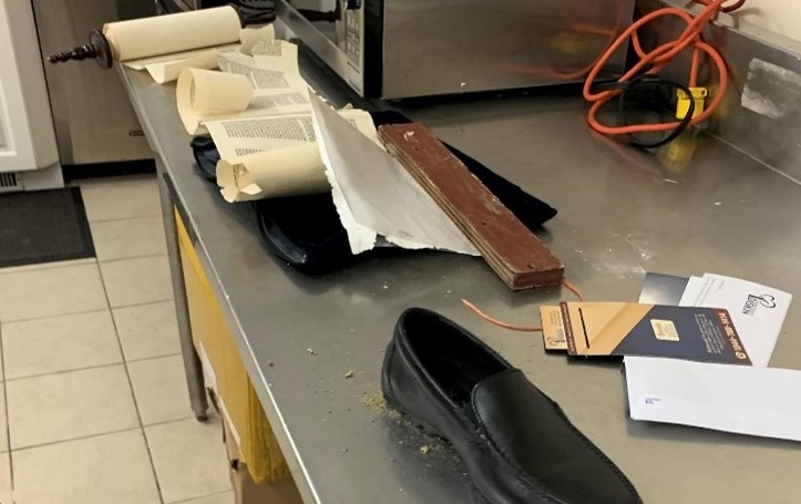 A photo showing the desecration of a Torah scroll at the Sepharade Kol Yehouda synagogue in Côte Saint-Luc. Friday, March 12, 2021.
