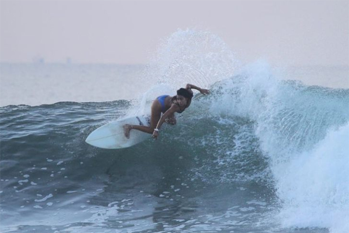 El Salvador surfer Katherine Diaz is shown surfing in this file photo.