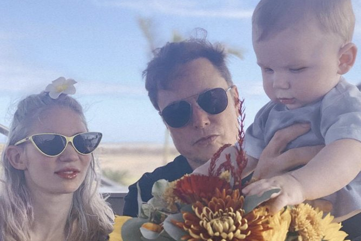 Grimes and Elon Musk are shown with their child X Æ A-Xii in Texas.