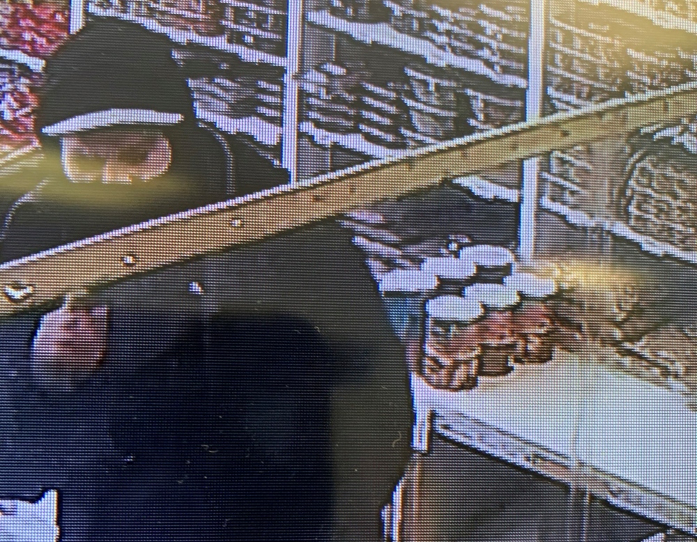 Guelph police say a man snatched money out of a woman's hand and ran away. 