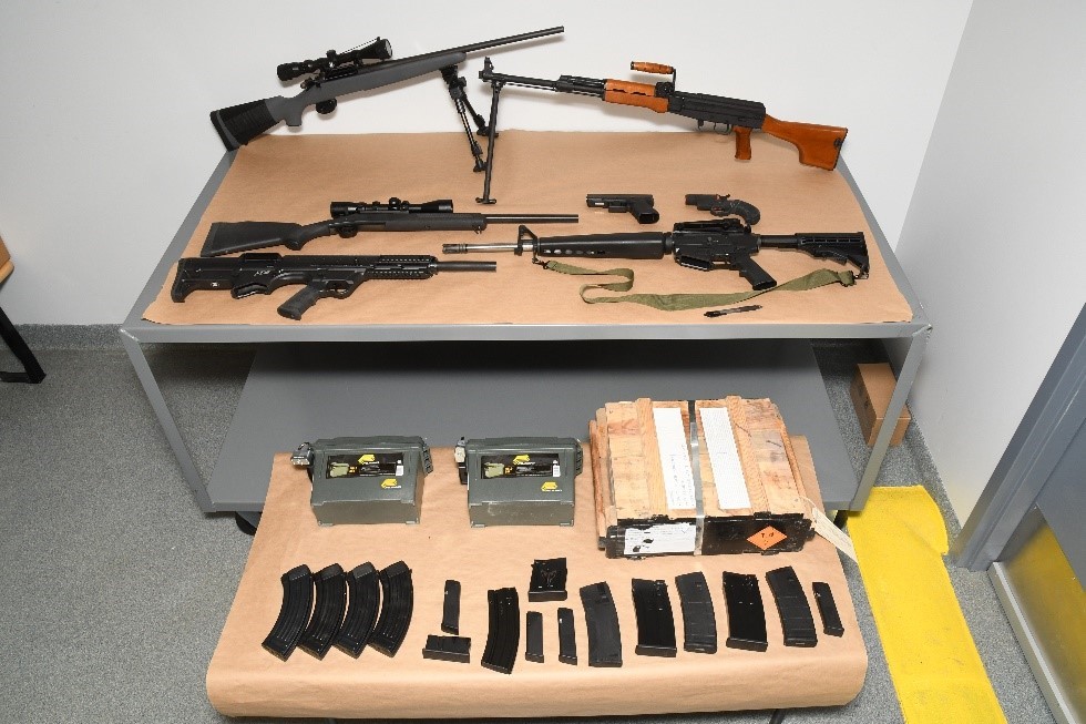 A 33-year-old man is facing 22 charges related to firearms and possessing body armour.