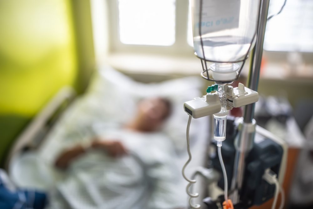 This file photo shows a patient getting a drip infusion at a hospital.