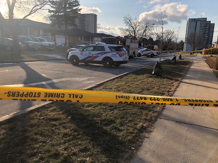 A photo of police on scene following a fatal fire on Mayberry Road in North York.