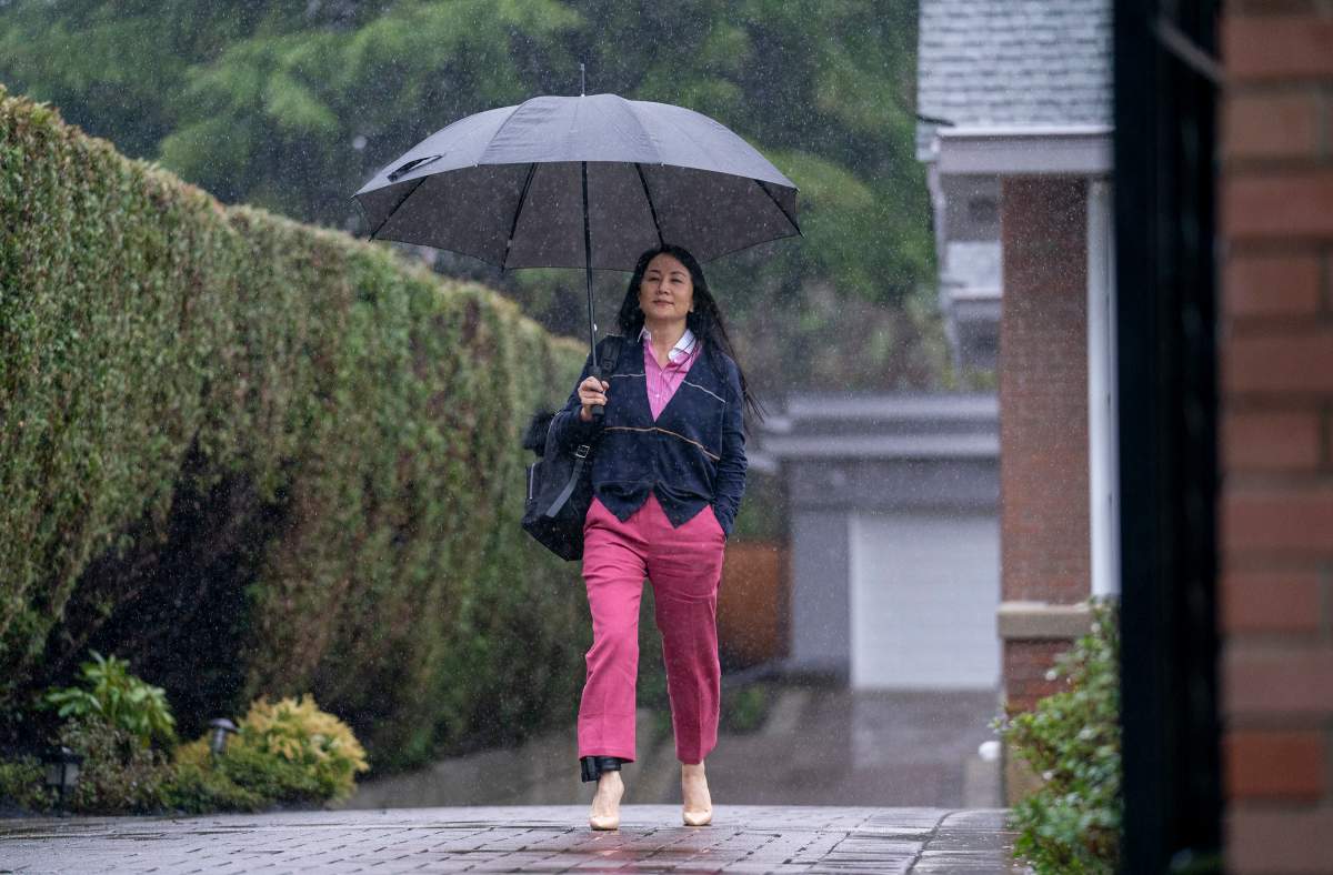 Chief Financial Officer of Huawei, Meng Wanzhou leaves her home in Vancouver, Wednesday, March 24, 2021 to go to B.C. Supreme Court. 