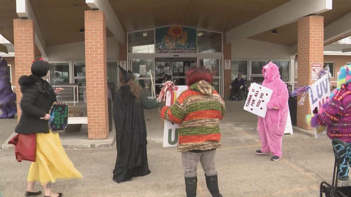Volunteers with the Misfitz perform at Father Lacombe Care Centre in Calgary on March 6, 2021.