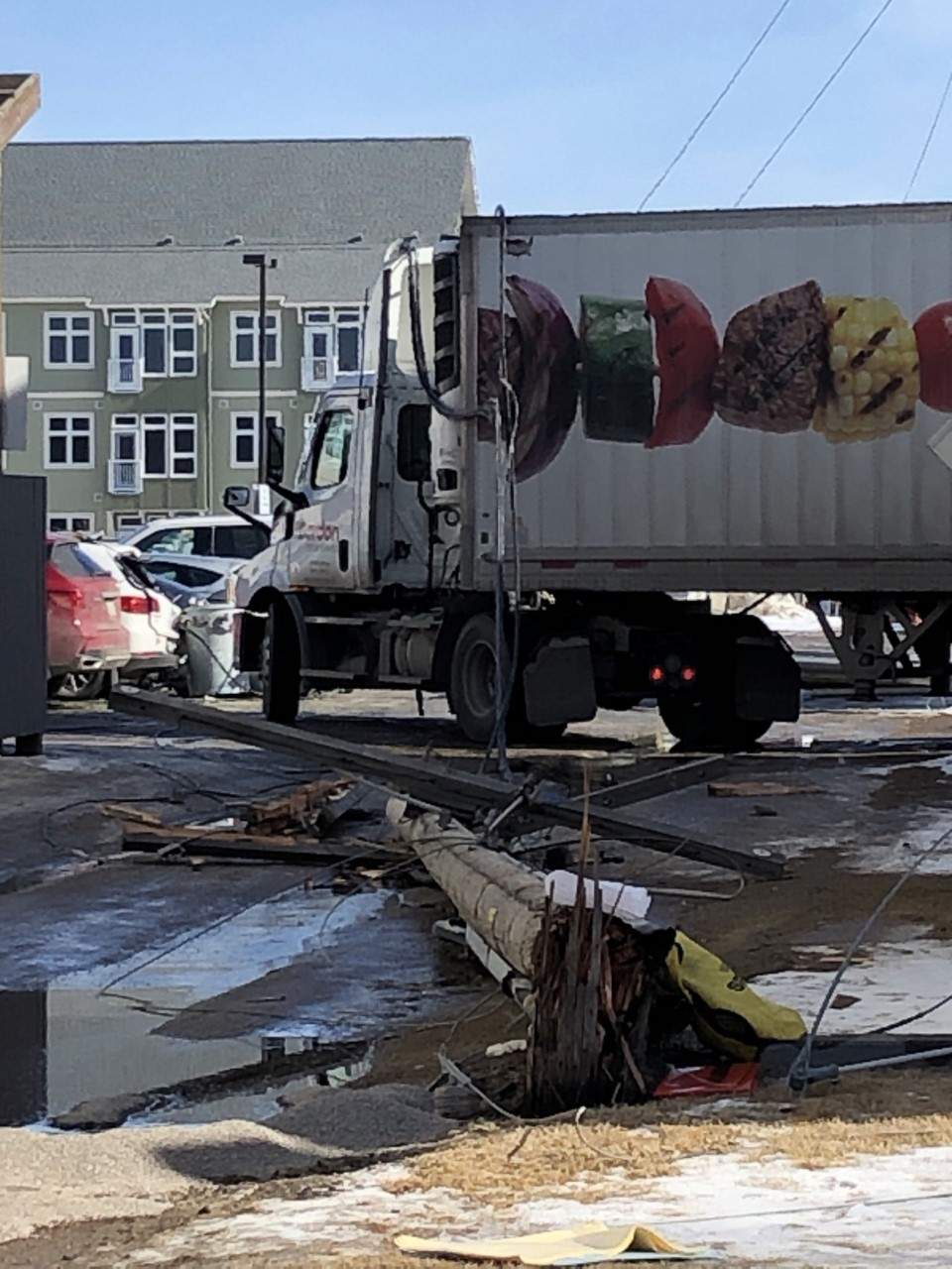 A closer look at the downed power pole at 2500 Broad Street in Regina.