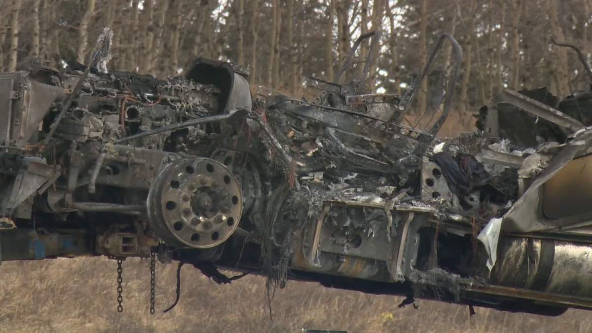 The charred remains of a semi-trailer on Highway 1 in Alberta on Sunday, March 7, 2021.