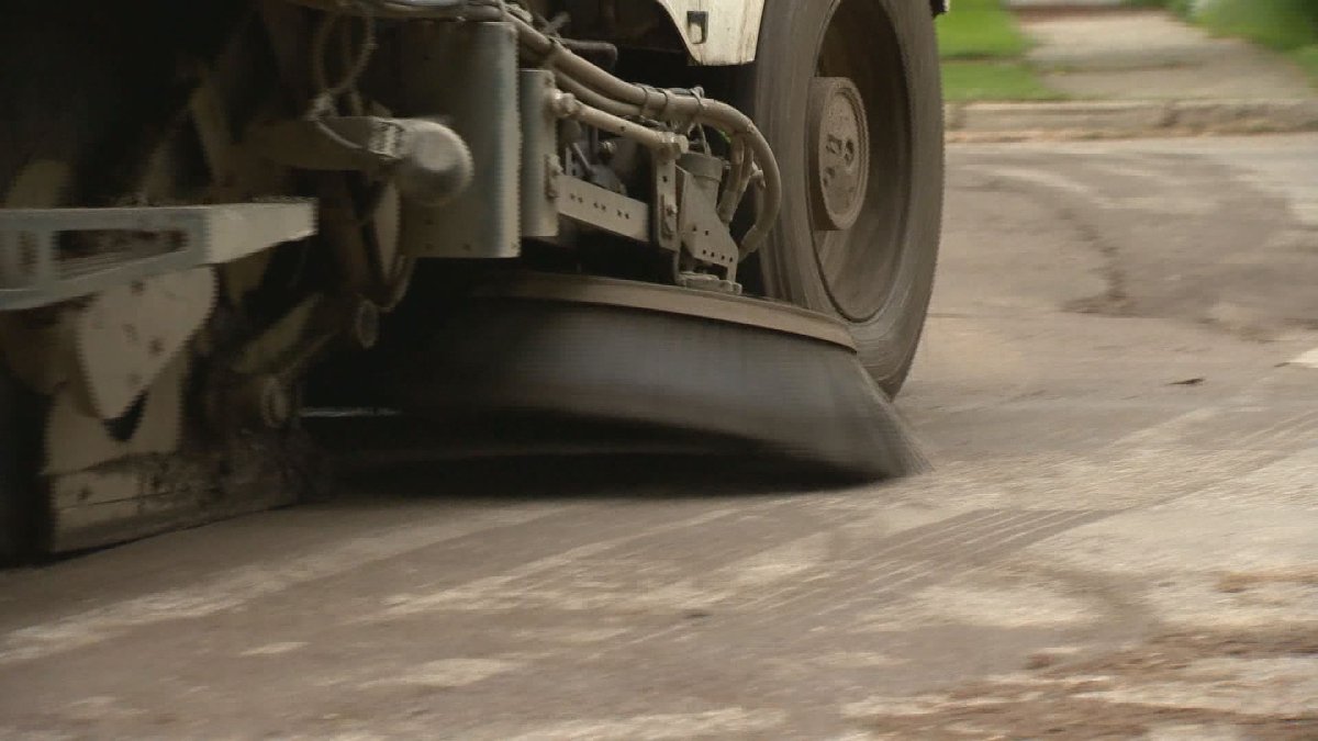 A street sweeping vehicle.