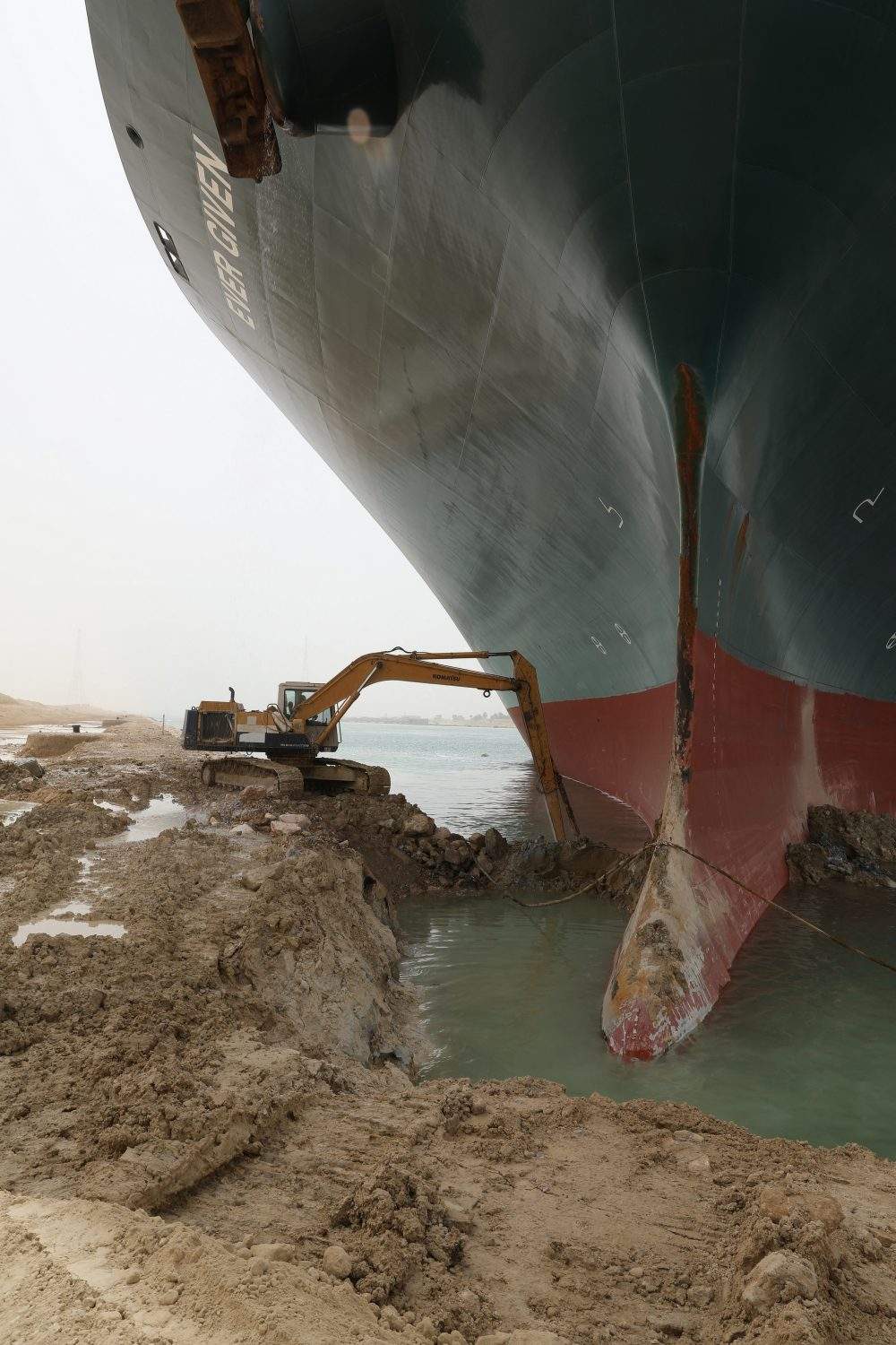 Navigation through the Suez Canal is temporarily suspended as large Panamanian container vessel Ever Green is blocking the traffic. Suez Canal, Egypt on March 25, 2021.