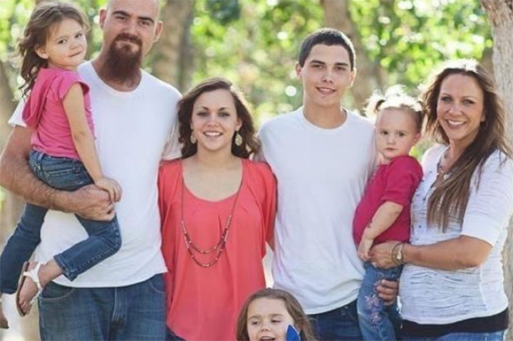 Jake and Jessica Woodruff are shown with their five children in this handout photo.