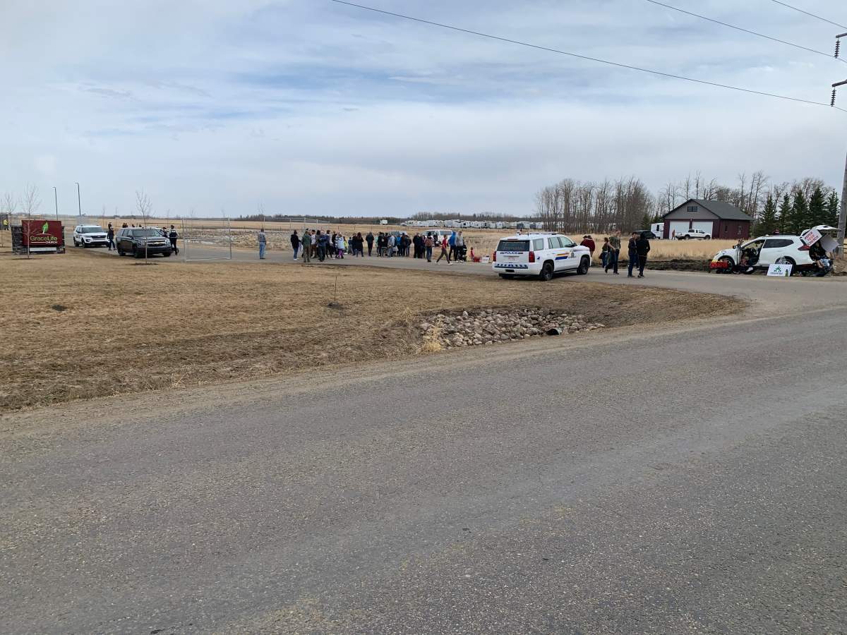RCMP and Alberta health officers fence off GraceLife Church west of Edmonton on Wednesday, April 7, 2021.