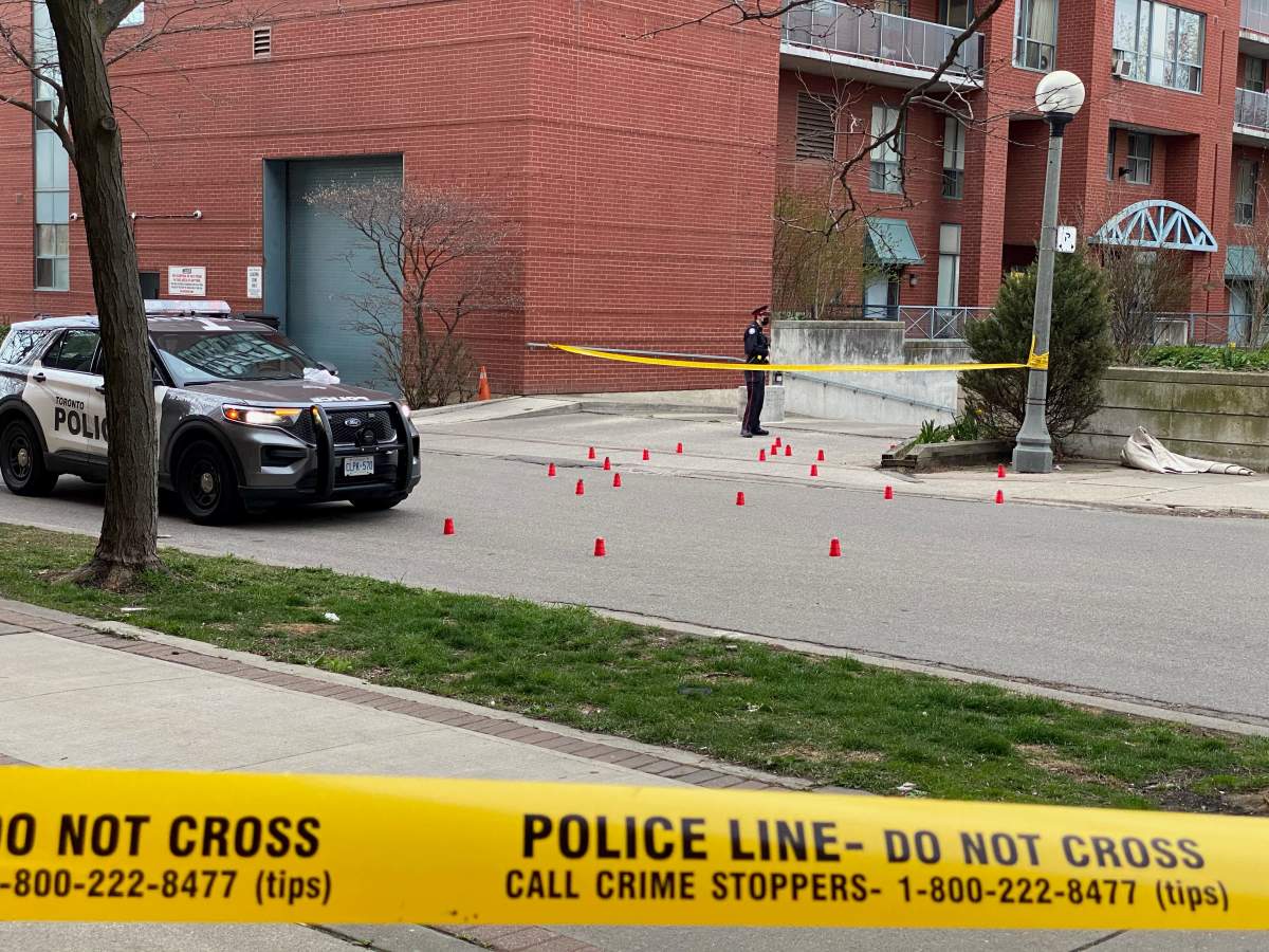 The scene where a 14-year-old boy has been taken to hospital after being shot in Toronto's west end Saturday evening.