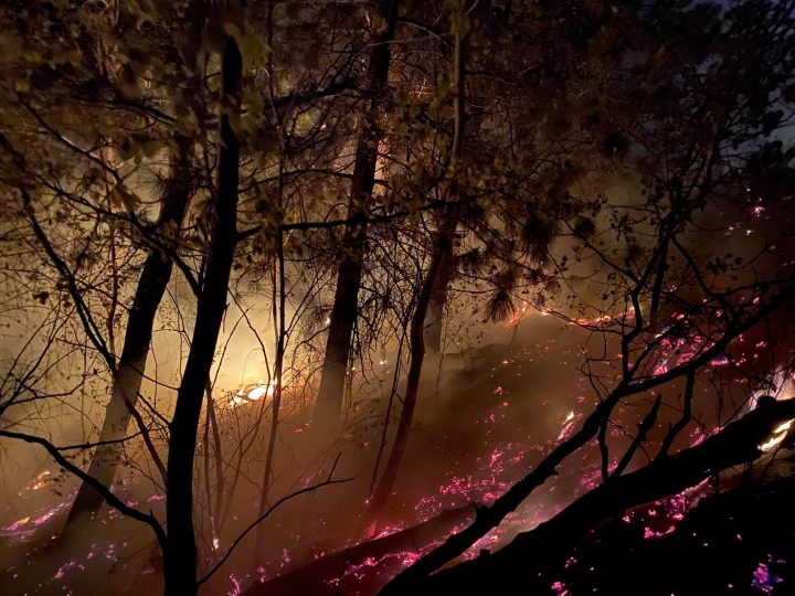 Firefighters were busy on Tuesday night, battling a ground fire on the east side of Osoyoos Lake.