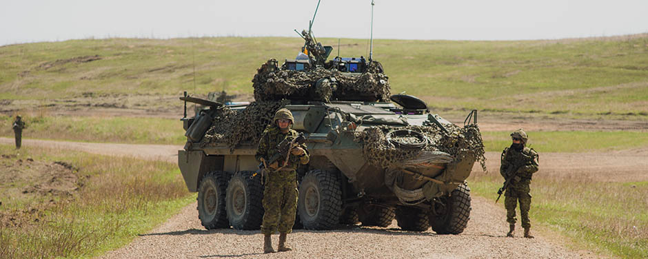 Canadian soldiers conduct a roadblock during Exercise Maple Resolve 2018 at CFB Wainwright on May 13, 2018.