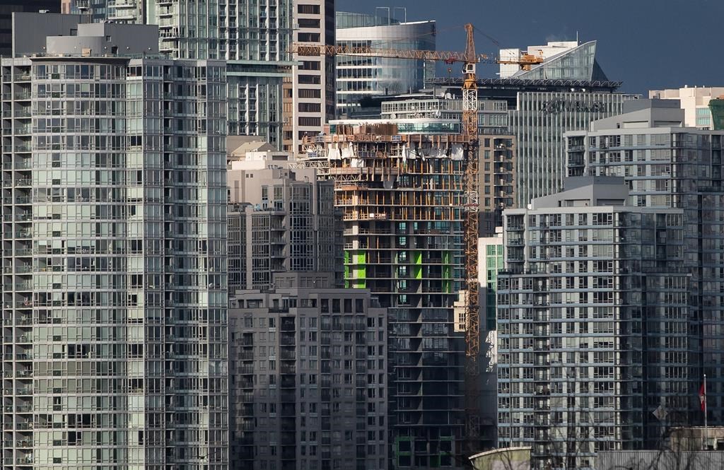 A condo tower under construction is pictured in downtown Vancouver on February 9, 2020.