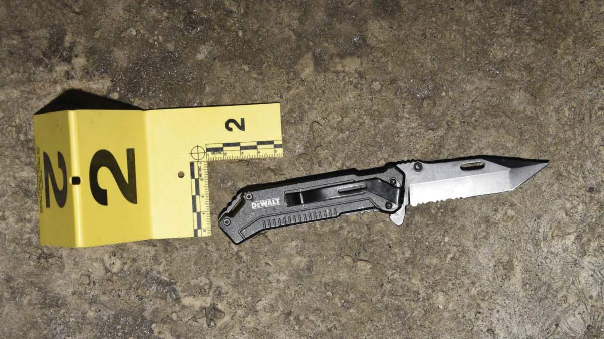 The folding knife recovered from the Calgary shooting scene in April 2018.