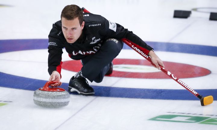 Team Canada skip Brendan Bottcher makes a shot against Russia at the Men's World Curling Championships in Calgary, Alta., Wednesday, April 7, 2021.