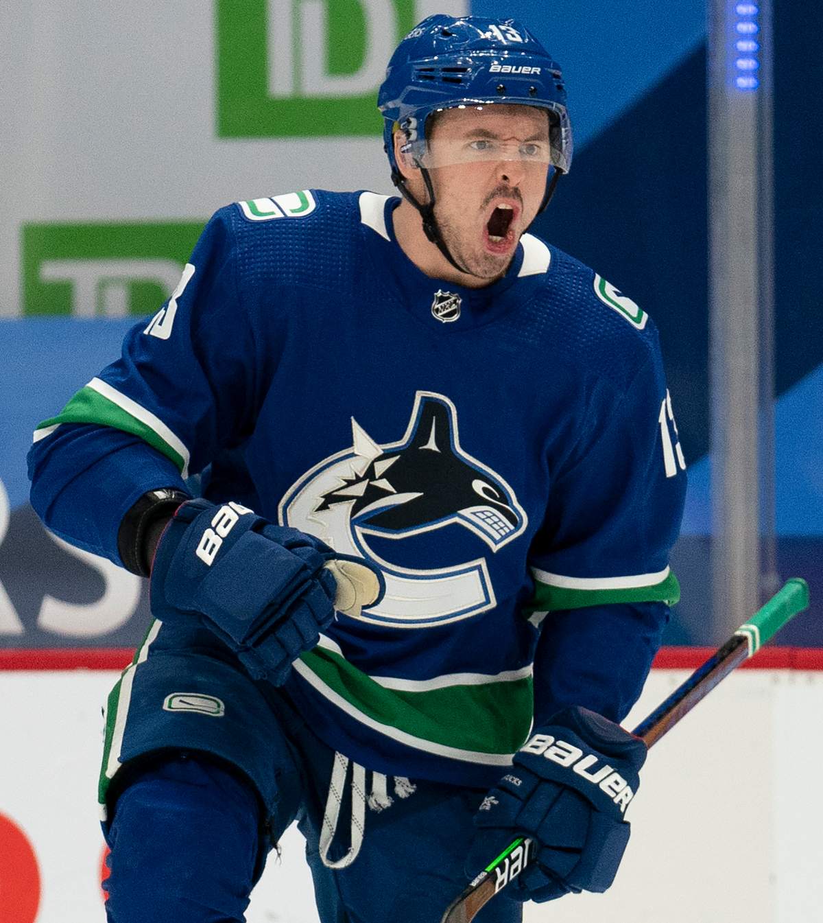 Vancouver Canucks centre Jayce Hawryluk (13) celebrates his team’s win over the Montreal Canadiens in Vancouver, Monday, March 8, 2021.