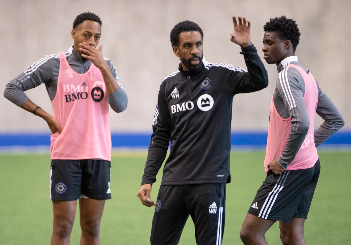 CF Montreal head coach Wilfried Nancy speaks to his players during the team's practice  Tuesday, March 16, 2021 in Montreal. 