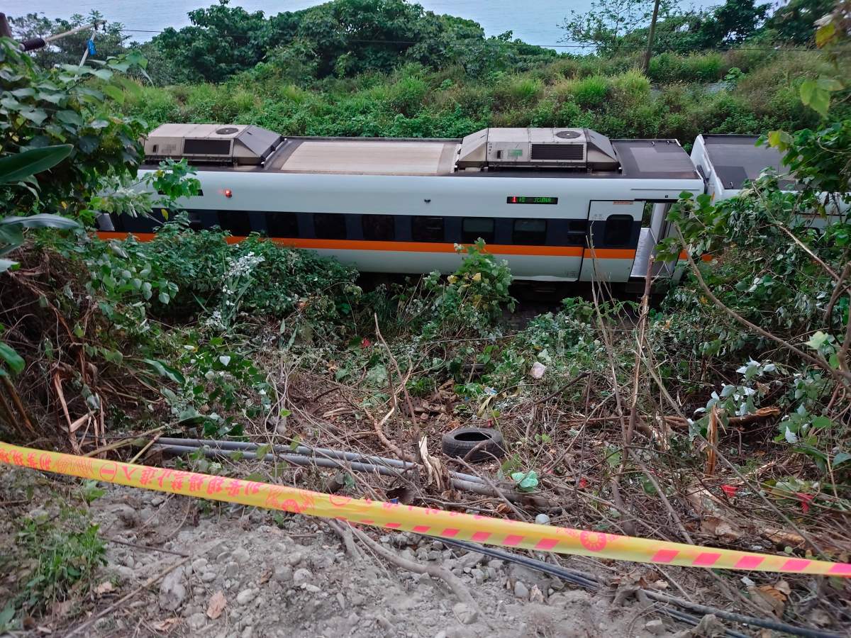 A section of a derailed train is seen cordoned off near the Taroko Gorge area in Hualien, Taiwan on Friday, April 2, 2021. (AP Photo/Chiang Ying-ying)