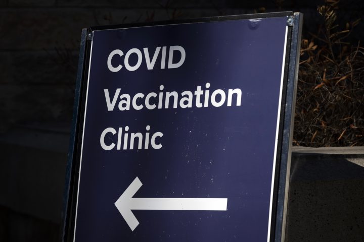 A sign for a COVID-19 vaccine clinic.