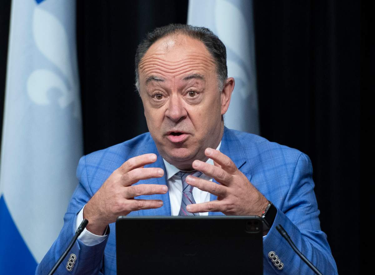 Quebec Health Minister Christian Dube responds to  reporters questions during a news conference on the COVID-19 pandemic, Tuesday, April 20, 2021 at the legislature in Quebec City. 