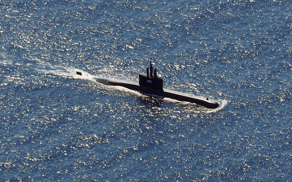 The Indonesian Navy submarine KRI Alugoro sails during a search for KRI Nanggala, which had gone missing in the waters off Bali Island, Indonesia, Thursday, April 22, 2021. (AP Photo/Eric Ireng)