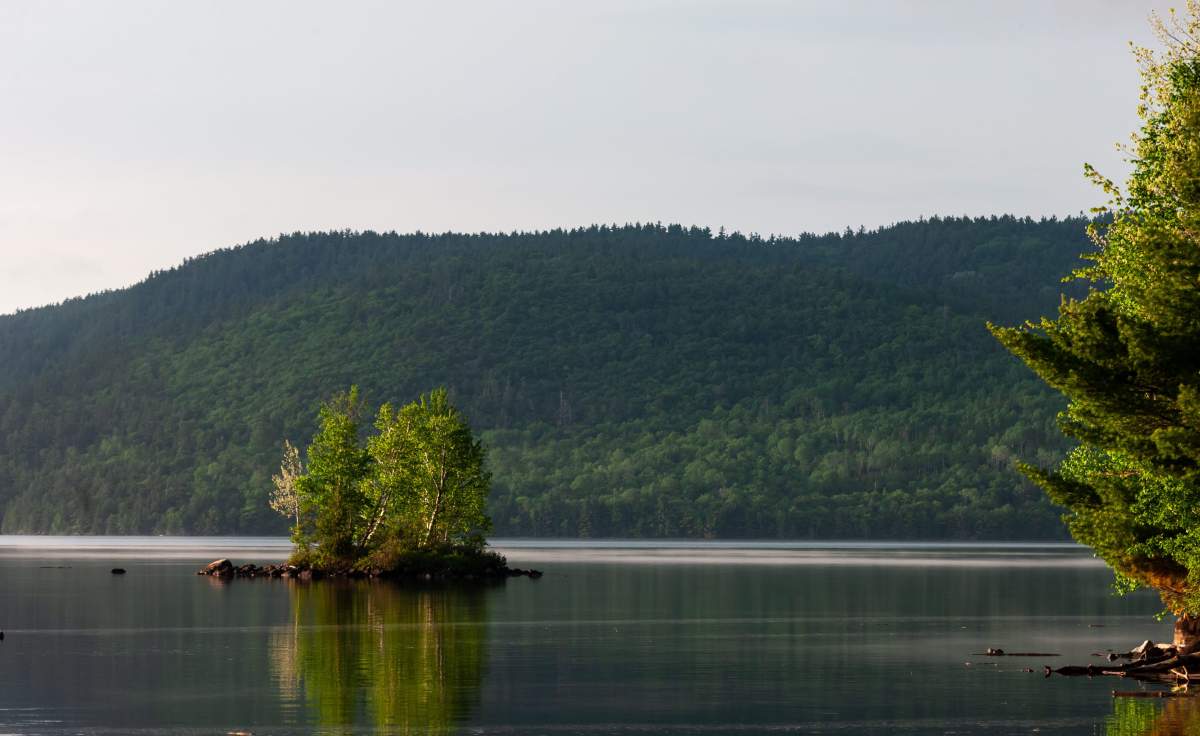 The Laurentian Mountains as seen from Drifwood Provincial Park across the Ottawa River west of Deep River, Ont, on June 9, 2018. 