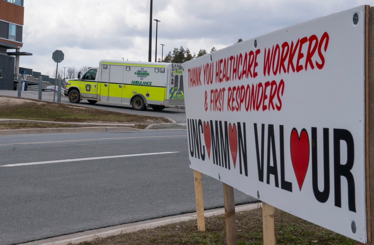 An ambulance races past a sign of support on its way into Peterborough Regional Health Centre on Friday, April 17, 2020.  On Thursday, April 22, the hospital reported another nine patient transfers from other hospitals.