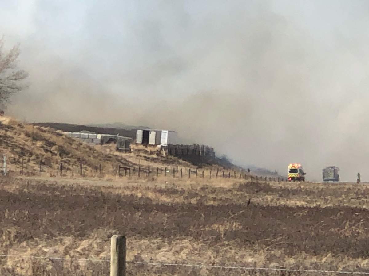 Crews battle a grass fire near Symons Valley Ranch April 1, 2021.