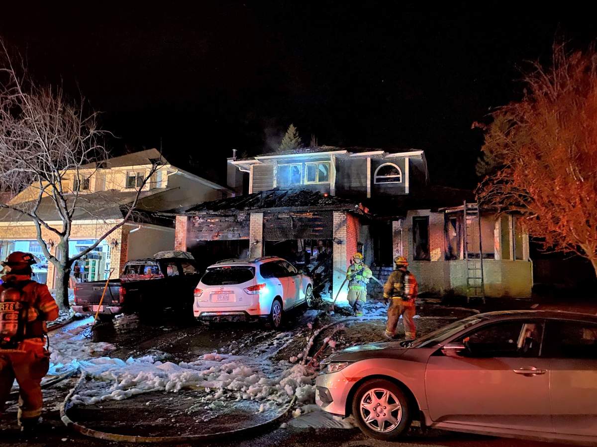 Calgary firefighters respond to a fire at 78 Shawnee Crescent S.W. on Wednesday, April 7, 2021.