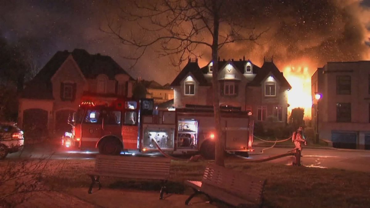 Fire destroys a luxury home under construction in Montreal's Ahuntsic-Cartierville district. Sunday, April 25, 2021.