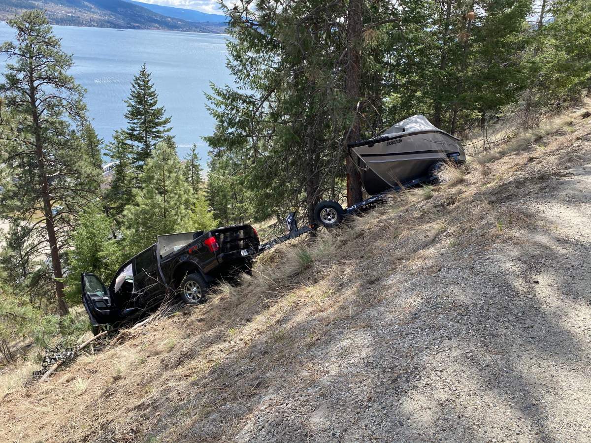 A Ford F150 towing a boat went down a steep embankment near Fintry on Saturday morning.