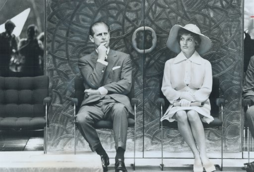 Prince Philip and Margaret Trudeau; wife of the Prime Minister, listen to the Queen as she officially opens the Lester B. Pearson external affairs building in Ottawa in 1973.