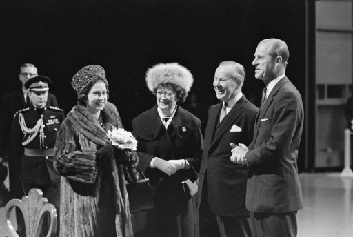 Queen Elizabeth II (L) and Prince Philip (R) are greeted on arrival from Quebec City to Ottawa by Prime Minister and Mrs. Lester Pearson.