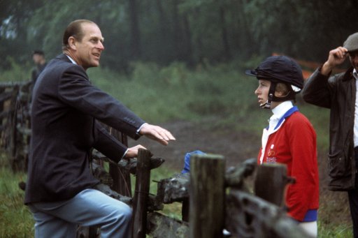 Princess Anne talking to her father, the Duke of Edinburgh, at Bromont, Que., during the cross country section of the three-day event at the Montreal Olympic Games.
