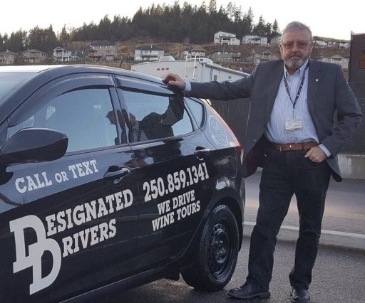 Gilles Laferriere, pictured here in 2017, with one of his designated driver vehicles.