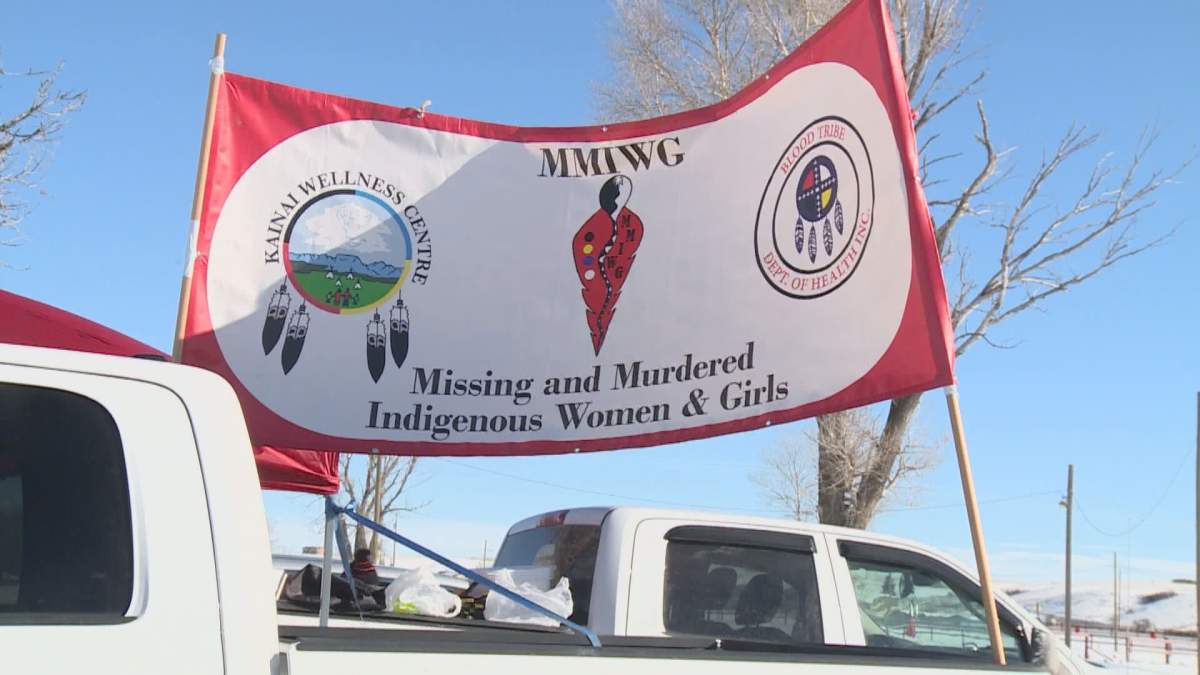 A sign displayed at the Redress event in Stand Off, Alta. on February 19, 2021. 