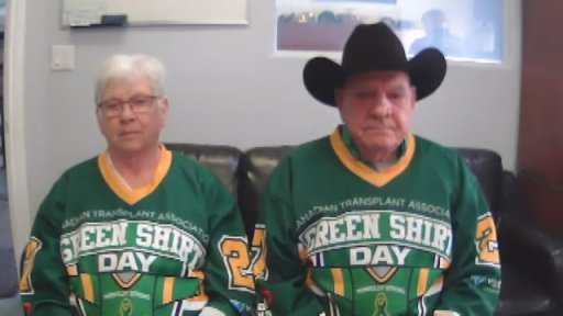 Faye and Morris Irvine pictured in Green Shirt Day jerseys during a Zoom interview on April 1, 2021.