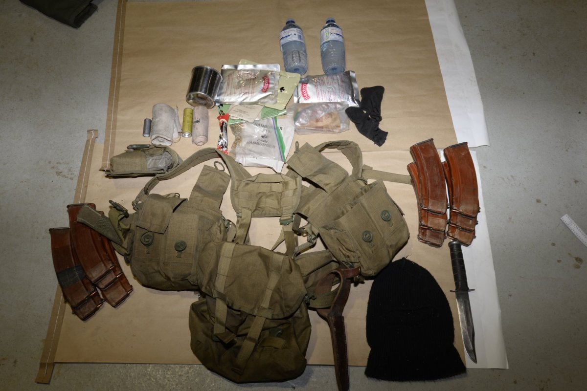 Weapons and paraphernalia seized by the Alberta RCMP  Integrated National Security Enforcement Teams in Parkland County in February 2021.
