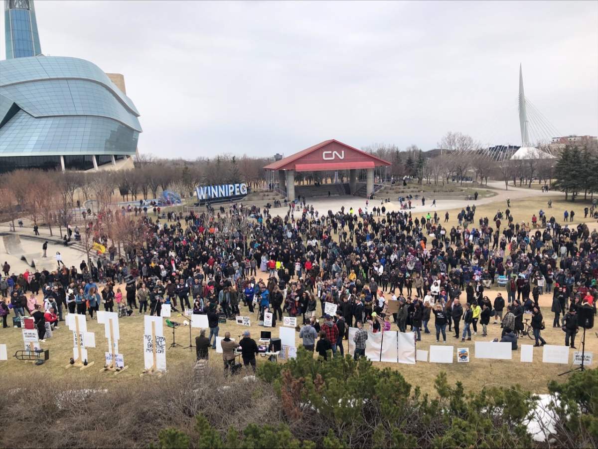 Hundreds of mostly-maskless Manitobans crowded the grounds at The Forks earlier this spring in protest of COVID-19 restrictions./GLOBAL NEWS.